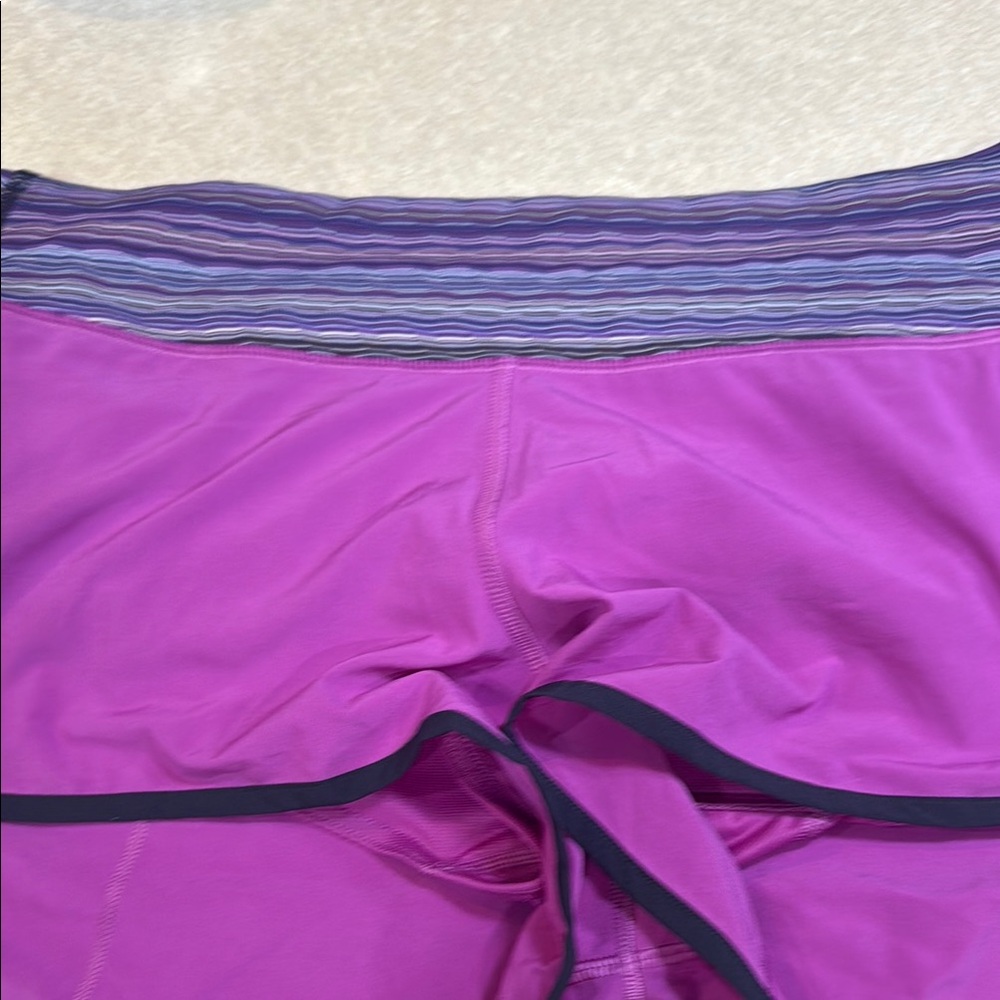 Purple and Black Athletic Shorts Lululemon size 10 zipper back in back